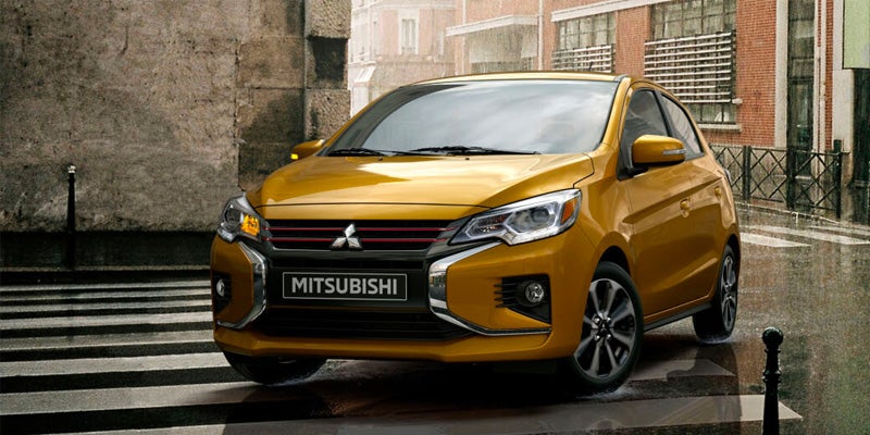 A yellow 2024 Mitsubishi Mirage G4.