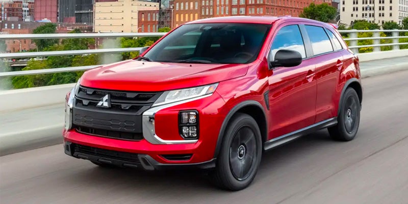 A red 2024 Mitsubishi Outlander Sport.